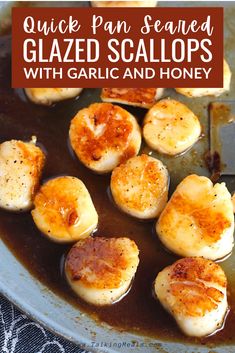 cooked scallops with garlic and honey in a pan