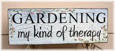 a sign that says gardening is my kind of therapy