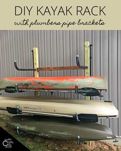 an old kayak rack with two paddles attached to it and the words diy kayak rack with plywood pipe brackets