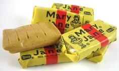 several pieces of candy sitting next to each other on a white surface with the word mary jane printed on it