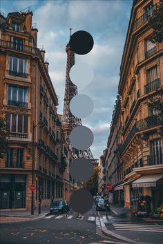 the eiffel tower in paris, france is surrounded by tall buildings