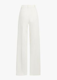 The Low Favorite Pant is our best-selling mid-rise trouser (formerly The Agnes Pant), cast in a structured Italian suiting fabric. With a fluid wide-leg silhouette and front pleats, these classic ivory pants are a true wardrobe essential.74% Polyester 20% Rayon 6% SpandexCare Instructions:Machine wash cold gentle cycleLine dryDry CleanMegan is 5'10" wearing size 2Rise: 11 1/2"Leg Opening: 21"Inseam: 34" Ivory Pants, National Daughters Day, Daughters Day, Suiting Fabric, Ivory Color, The Low, Winter White, Wardrobe Essentials, Black Pants