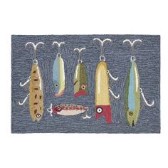 a rug with different types of fish hanging from hooks on the front and back of it