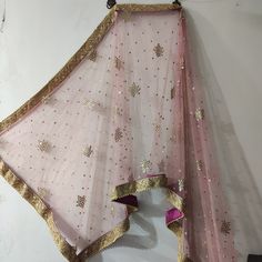 This Bridal Dupatta is sequin embroidered on net with beautiful golden border. This can be your wedding dress chunni for Indian occasion wear for festival. This has perfect bling for you to look classy and ethnic at same time. We can make in other colors. Pair it up with skirt and blouse from our shop. NOTE : There might be slight color variation due to different colour settings. Bridal Dupatta, Indian Skirt, Indian Lehenga Choli, Golden Border, Beading Netting, Punjabi Dress, Embroidered Scarf, Look Classy, Indian Lehenga