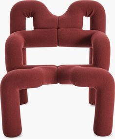 the back end of a chair made out of two pieces of red fabric, with one piece