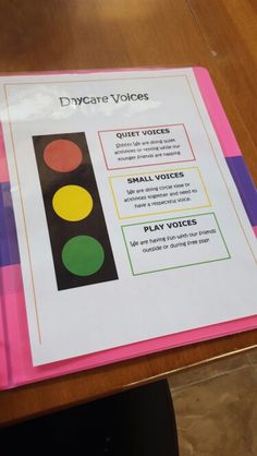 there is a pink book with instructions on how to use the traffic lights for safety