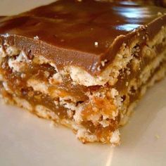 Crunchy, caramely, chocolatey - there is a lot to love in these tasty little treats. 1 Dz bars per batch. Crunchers Recipe, Camping Menu Ideas, Layered Deserts, Million Dollar Cake, Pumpkin Spice Donut Holes, Dollar Cake, Caramel Cakes, Candy Bar Recipe, Club Crackers