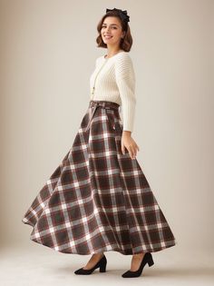 This winter wool skirt is a classic piece of tailoring that will see you through rain or shine. It is cut with a flattering flared skirt to give you a wonderful shape. The winter skirt is perfect classic styling and ends at the ankle. This is a versatile skirt that you'll wear again and again. DETAILS: * 30% wool, 30% fiber, 40% polyester * fully satiny liner * Two side pockets * Right zip closure * has belt loops to keep everything in place  * elastic band at the back to provide some stretch * Plus size full skirt * Ankle length skirt * Perfect for Winter, autumn * Lean More about the items From the FAQs on the page bottom The model is 170 cm (5′ 7″) tall with a 80 cm (31.5") bust, 66 cm (26") waist. She is wearing the plaid wool skirt in size XS. CUSTOM MADE SERVICE If you * Change other Chic Long Plaid Skirt, Plaid A-line Skirt With Lining, Plaid Flared Skirt, Plaid Flared Relaxed Fit Skirt, Plaid Flared Skirt With Relaxed Fit, Wool Pleated Skirt Bottoms For Fall, Plaid Lined Skirt For Winter, Plaid Midi Skirt For Fall, Plaid Midi Skirt With Lining