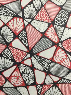 red and black art work on white paper