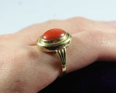 -Vintage 14k Gold Cabochon Natural Deep Red Orange Coral Ring -Ring size: 5.75 US -Coral size: 11.4 mm x 8.65 mm -Total weight: 4.3 g -Marked 585 Classic Red Oval Cabochon Signet Ring, Vintage Red Signet Ring With Oval Cabochon, Red Oval Cabochon Signet Ring For Formal Occasions, Vintage Red Oval Cabochon Signet Ring, Red Domed Gemstone Rings, 14k Gold Red Cabochon Ring, 14k Gold Cabochon Red Ring, 14k Gold Rings With Red Cabochon, Red Domed Rings For Anniversary