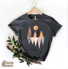 Geometric Shirt, Minimalist Women Shirt, Geometry Design T-Shirt, Psychedelic Shirt, Art Teacher Gift, Graphic Tee,Aesthetic Men Clothing ✨ Thank you for shopping! BEST WAY TO ORDER 1. Select the size(Please make sure to check our size chart) 2. Select the color 3.Add a note to seller when checking out with any special requests UNISEX SHIRTS -Unisex t shirt fits like a well-loved favorite, featuring a crew neck, short sleeves and designed with superior airlume combed and ring-spun cotton-polyester that acts as the best blank canvas for printing. -Features: Side-seamed. Retail fit. Unisex sizing. Shoulder taping. WOMEN VNECK SHIRTS -Fabric: Lightweight Cotton Poly Jersey. -60% Combed Ring-Spun Cotton 40% Polyester / 30 singles, 135 grams/4.0oz. -Binding: Set-in Collar 1x1 Baby Rib with Fron Artistic Cotton Tops With Abstract Print, Artistic Cotton Top With Abstract Print, Artsy Printed Crew Neck Tops, Casual Geometric Graphic Print Tops, Artistic Crew Neck Tops With Abstract Print, Black Artsy Tops With Graphic Design, Artsy Black Tops With Graphic Design, Artsy Black Top With Screen Print, Artsy Crew Neck Shirt With Relaxed Fit