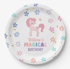 a paper plate with a pink pony on it's side and flowers around the edges