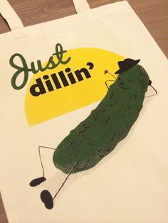 a tote bag with an image of a cucumber