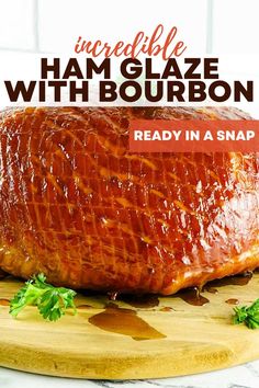 Whole ham on a cutting board coated in a brown glaze. Bourbon Ham Glaze, Bourbon Ham, Glazed Baked Ham, Smoked Ham Recipe, Raisin Sauce, Easy Sauce Recipe