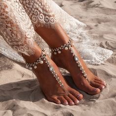 Elegant, amazing, and just as the perfect wedding ceremony, these beach wedding barefoot sandals have a rich Bohemian glamor. These barefoot sandals are made on a silver-colored chain with a hint of faux pearl charms and crystals. These barefoot sandals closing at the ankle with a clasp. Select one of the appropriate sizes from the drop-down menu. SIZING: Please select your US shoe size from the drop-down menu. Please use the size chart on the last listing image to find out your size. These could be made in kids sizes as well, just select the size you need. The price is for a pair, 2 pieces. MORE like these: https://etsy.me/2MujGMv To see more of accessories, please click here: http://www.etsy.com/shop/BareBados Small Beach Wedding Ceremony, Beach Wedding Ideas Colors, Beach Wedding Shoes For Bride, Beach Wedding Footwear, Boho Beach Wedding Ideas, Classy Beach Wedding, Green Beach Wedding, Beach Bride Dress, Beach Elopement Ceremony