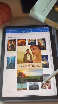 an ipad with movies on the screen