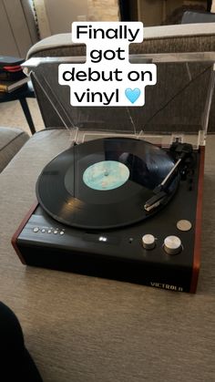 an old record player with the words finally got debuut on vinyl