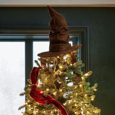 a harry potter hat on top of a christmas tree