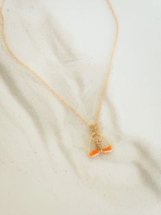 Our Virgen del Valle Pendant is a Special Edition necklace. It was created with 14K laminated Yellow Gold Wires and 2 mm crystals. As all of our pieces, this is a 100% handcrafted. This Necklace is a unique, delicate gift for any religious occasion.   Limited edition. Non-toxic Dangle Necklaces As Gifts, Orange Jewelry With Lobster Clasp For Gift, Orange Charm Jewelry For Gifts, Orange Necklace With Adjustable Chain For Gift, Orange Necklace With Adjustable Chain As Gift, Adjustable Orange Nickel-free Necklace, Nickel-free Orange Necklace As Gift, Dainty Orange Jewelry For Gift, Orange Metal Necklace For Gift