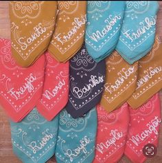 many different colored bandannas with the word love written on them in various languages