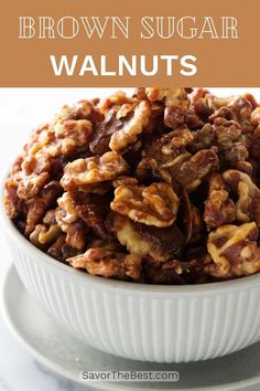 a white bowl filled with nuts on top of a table