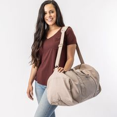 Nothing beats the simplicity and functionality of a good duffel bag—except maybe our Bumi Eco Duffel Bag, made with the good of the environment and people in mind! The perfect size for a spontaneous weekend getaway or when you need a little more room to haul daily gear for work or athletics. Made with 14-oz Certified Fairtrade Organic cotton canvas. Made in a Fair Trade Certified™ factory. Beige Large Capacity Gym Bag For Everyday Use, Large Capacity Beige Gym Bag For Everyday Use, Versatile Large Capacity Beige Duffle Bag, Versatile Beige Large Capacity Duffle Bag, Beige Travel Bag With Adjustable Strap For Weekend Trips, Casual Beige Bag For Overnight Trips, Eco-friendly Canvas Travel Bag With Adjustable Strap, Eco-friendly Travel Canvas Bag With Adjustable Strap, Travel-friendly Eco-friendly Canvas Bag With Adjustable Strap