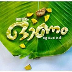 the words goro written on a banana leaf are surrounded by pieces of fruit and nuts