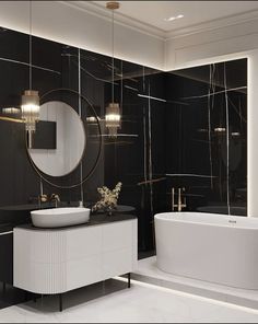 a black and white bathroom with two sinks and a bathtub in the middle of the room