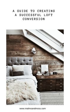 a bed sitting under a window next to a wooden wall with the words, a guide to creating a successful loft conversation