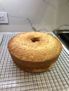 a cake sitting on top of a cooling rack