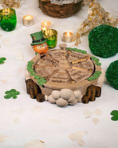 a table topped with lots of green decorations