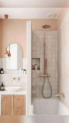 a bathroom with a sink, mirror and bathtub