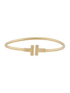 From the Tiffany T Collection18K Yellow Gold Tiffany And Co Bracelet Tiffany & Co., Tiffany & Co. Bracelet, Tiffany T, Belt Shop, Wire Bracelet, Saint Laurent Bag, Work Bags, Bag Handle, Christian Louboutin Shoes