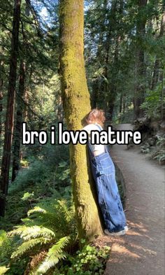 a person leaning against a tree with the words i love nature so much