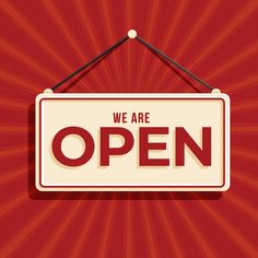 we are open sign hanging on a red wall with rays coming in the background illustration