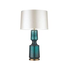 a blue table lamp with a white shade on it