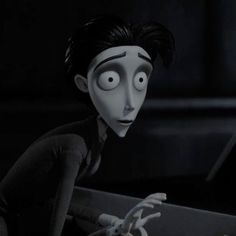 an animated character with black hair and eyes