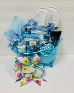 This unique keepsakes bathtub inspired home spa basket includes fragrant ocean sent bubble bath, shower gel, bath salts, body lotion, keepsake waffle slippers, scented candle and a scented candle to complete the true home spa experience making this the perfect any occasion gift for birthday, anniversary, thank you and more all wrapped up with a beautiful handmade bow and a hand written card with your message. Waffle Slippers, Soda Cakes, Cake Gift Basket, Baby Shower Game Prizes, Soda Cake, Spa Basket, Gifts Baskets, Ocean Gifts, Beer Cake