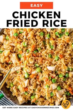 chicken fried rice in a skillet with peas and carrots