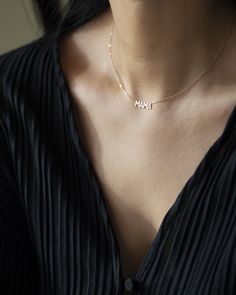 In celebration of all the great mothers around the world, treat the mom in your life to this piece of jewelry they deserve with this gold mama necklace. A perfect way to express what means most to you! Available in 14K yellow, rose or white gold Letters measure about 5mm in height Necklace total length is measured from end to end Dainty minimalist everyday necklace Meaningful Gold Birthstone Necklace, Minimalist Birthstone Necklaces For Mother's Day, Minimalist Name Necklace Gift For Mom, Minimalist 14k Gold Necklaces For Mother's Day, Minimalist 14k Gold Necklace For Mother's Day, Delicate Everyday Charm Necklaces For Mother's Day, Delicate Sterling Silver Name Necklace, Delicate Rose Gold Necklace Gift For Mom, Rose Gold Necklace With Delicate Chain For Mom