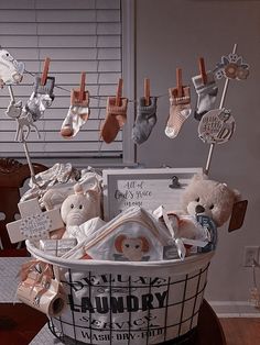 a basket filled with baby items on top of a table