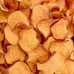 a pile of potato chips sitting next to each other