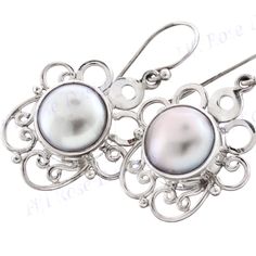 "13/16\" Freshwater Pearl 925 Sterling Silver Earrings Quality handcrafted earrings in 925 sterling silver. Please look at the finesse of the settings and excellent polish of the silver. A trusted designer since 2003. Wholesale discounts and custom design services available to qualified buyers (minimums apply). Hook Type: French wires Silver Type: 925 Sterling Silver Earring Size: 21x18mm(13/16x11/16\")w/o wire Earring Weight: ~3.3grams/ea Earring Material: Freshwater pearl(10mm) Price: 24.95" Classic Sterling Silver Nickel-free Pearl Earrings, Classic Nickel-free Sterling Silver Pearl Earrings, Pierced Sterling Silver Pearl Earrings, Fine Jewelry Sterling Silver Pearl Earrings, Sterling Silver White Gold Matching Pearl Earrings, Formal Sterling Silver Pearl Earrings, Nickel-free White Gold Sterling Silver Pearl Earrings, Sterling Silver White Gold Pearl Earrings For Pierced Ears, Silver Pierced Drop Pearl Earrings