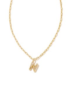 Personalize your everyday look with the Crystal Letter N Gold Short Pendant Necklace in White Crystal. Whether you’re rocking your initial or a loved one’s, this sentimental layer is one you’ll keep coming back to again and again. Metal 14k Gold Over Brass Material White CZ Closure Lobster clasp Size 16" chain w/ 3" extender, 0.62"L X 0.35"W pendantDue to the one-of-a-kind nature of the medium, exact colors and patterns may vary slightly from the image shown. | Kendra Scott Crystal Letter N Gold Short Pendant Necklace in White Crystal | Metal Steve Madden Mules, Short Pendant Necklace, Eyewear Kids, Gold Letter Necklace, Gold Shorts, Letter N, Buy Crystals, Initial Jewelry, Again And Again