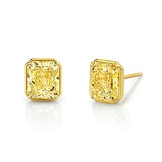 Discover unparalleled elegance with our Fancy Yellow Radiant Cut Diamond Studs, set in luxurious 18k yellow gold. These exquisite earrings feature captivating yellow diamonds meticulously certified for their exceptional quality. Each radiant-cut diamond exudes brilliance and sophistication, perfectly complemented by the warmth of the yellow gold setting. Luxury Yellow Earrings For Pierced Ears, Canary Yellow Diamonds, Yellow Diamonds, Radiant Cut Diamond, Yellow Gold Setting, Fancy Diamonds, Radiant Cut, All That Glitters, Yellow Diamond