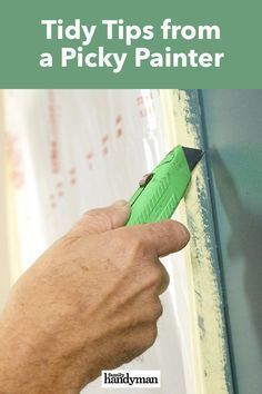 a hand holding a green paint roller with the words tidy tips from a picky painter