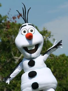 an inflatable snowman with black and white spots