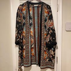 Never Worn, Perfect Condition! No Size Listed, Fits Like A M Or L Open Front Printed Cardigan For Fall, Fall Floral Print Long Sleeve Kimono, Casual Black Cardigan With Floral Print, Casual Fall Patterned Kimono, Orange Long Sleeve One Size Cardigan, Casual Patterned Fall Kimono, One Size Orange Long Sleeve Cardigan, Multicolor Printed Cardigan For Fall, Multicolor Open Front Outerwear With Floral Print