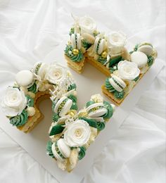 there are two pieces of cake with flowers on them