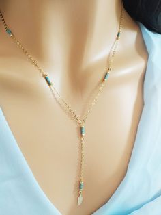 "Y Shaped Necklace Elegant .Bridesmaid gift, Bridal necklace, mothers day gift, wedding jewelry, Streamlined, Necklace: \"Y Shaped Turquoise Necklace set\" special trendy necklace. Consists of two chains to choose from: 1. Tiny turquoises choker / necklace. 14K gold filled necklace or Rose gold filled or Sterling Silver 925 2. Y Shaped Tiny Turquoise Necklace. 14K gold filled necklace or Rose gold filled or Sterling Silver 925 - Delicate sterling silver chain, components and findings. - Shown at Gold Wire Wrapped Lariat Necklace As Gift, Handmade Lariat Jewelry For Wedding, Elegant Adjustable Necklace For Mom, Adjustable Dangle Backdrop Necklace For Gift, Handmade Dangle Lariat Necklace For Gift, Dainty Handmade Lariat Necklace With Dangle, Elegant Dangle Jewelry For Mom, Wedding Lariat Jewelry With Adjustable Length, Dangle Wire Wrapped Lariat Necklace Gift